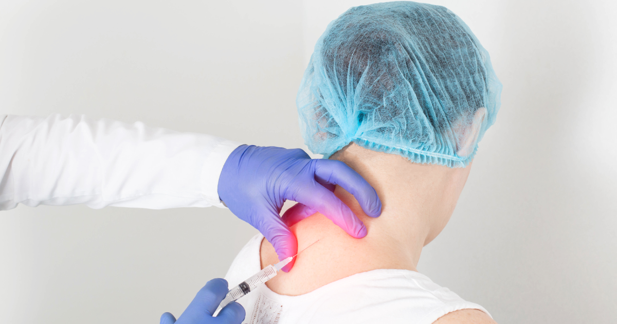 Doctor giving a Trigger Point Injections to a patient in a medical clinic in Sycamore, IL | NUVO Aesthetics Clinic